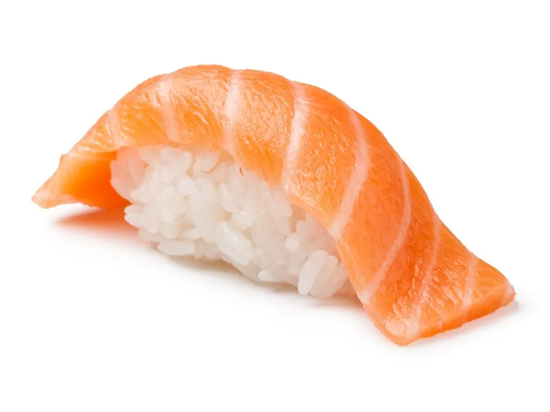 Salmon nigiri sushi shot on white backdrop at Sucré d’Amour Café & Sushi, a Sushi Restaurant in Fremont